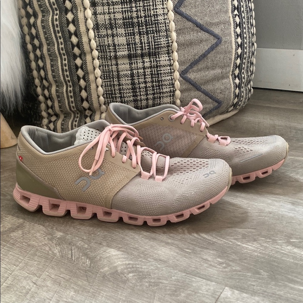 On Running Gray and Pink Athletic Shoes with Unique Sole Design